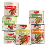Sechs GEFRÖ Gewürzdosen mit verschiedenen Mischungen, darunter Paprika-Chili, Kräuterwürze und Salatwürze.
