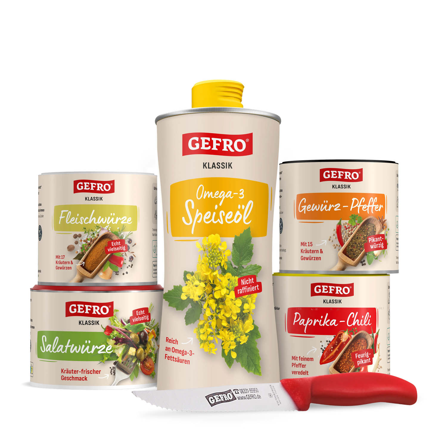 GEFRO Gewürze und Omega-3-Speiseöl als Produktset mit Küchenmesser, freigestellt vor schwarzem Hintergrund