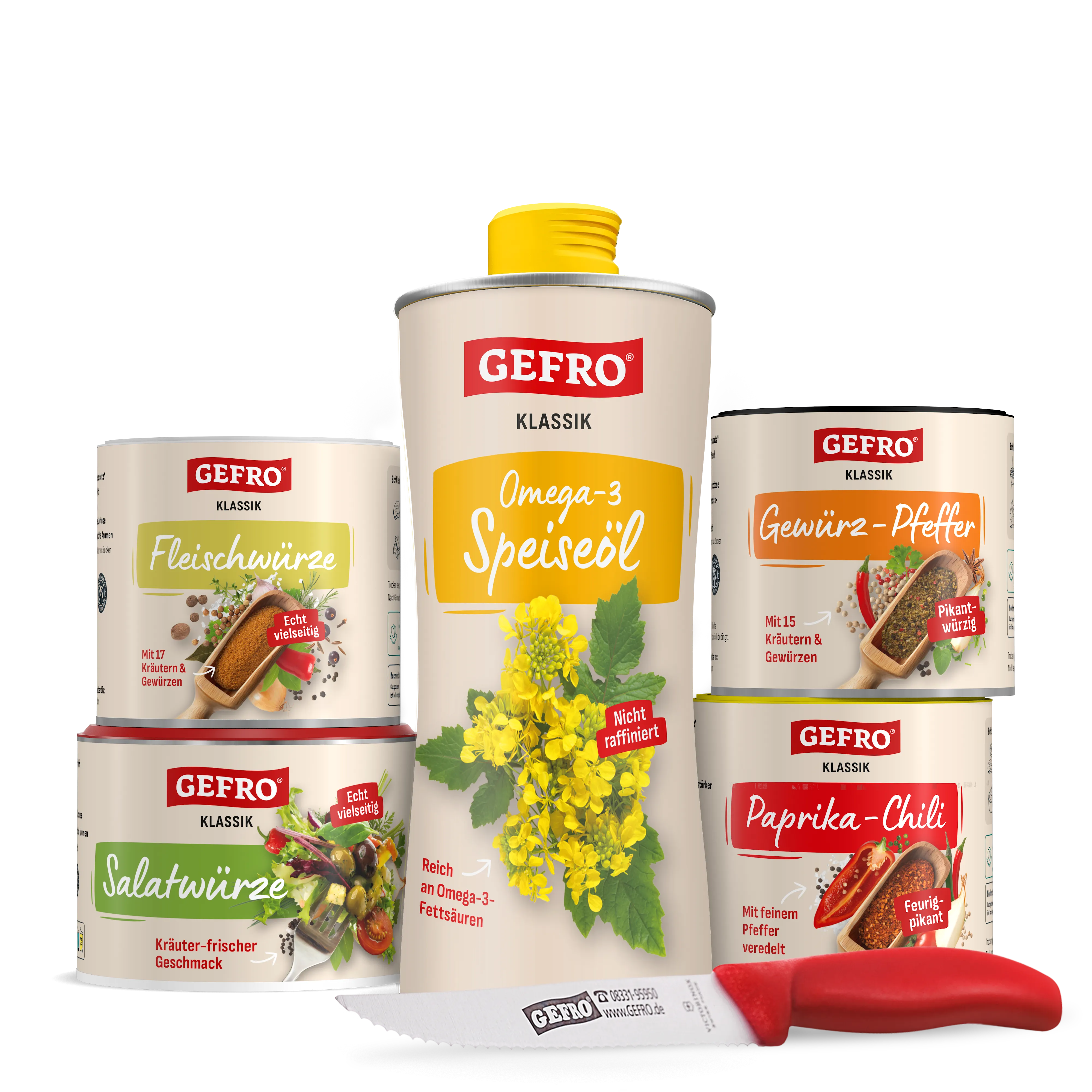 GEFRO Gewürze und Omega-3-Speiseöl als Produktset mit Küchenmesser, freigestellt vor schwarzem Hintergrund