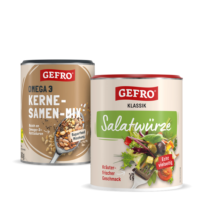 Zwei GEFRO Dosen mit Kernesamen-Mix und Salatwürze, nebeneinander als Produktbild vor weißem Hintergrund