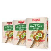 Drei Packungen GEFRO Klassik Korn & Lauch Schnitzel, vegetarische Pfanne mit Lauch und Hartkäse, frontal gezeigt