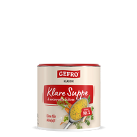 Dose Gefro Klassik Klare Suppe und universelle Würze, Produktverpackung in Creme mit rotem Etikett und Suppenlöffel