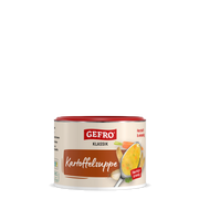 GEFRO Klassik Kartoffelsuppe in Dose, vorne mit Löffel cremiger Suppe sowie Kartoffeln, Karotte, Zwiebel und Petersilie