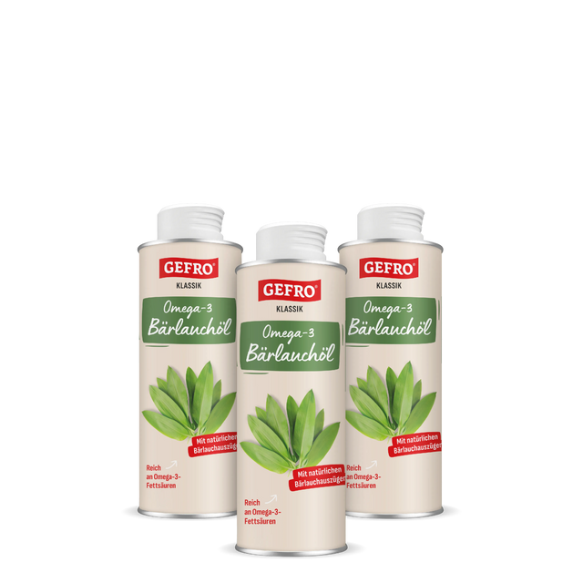 Drei Dosen GEFRO Klassik Omega-3 Bärlauchöl mit grünem Bärlauchmotiv, freigestellt auf schwarzem Hintergrund