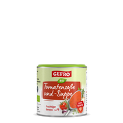 Dose GEFRO Bio Tomatensoße und -Suppe, Vorderansicht mit roter Suppe auf Löffel und Tomatenmotiven auf dem Etikett