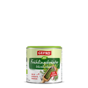 Dose GEFRO Bio Frühlingskräuter Würzmischung, grüne Gewürzmischung mit Kräutern auf weißem Hintergrund.