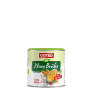 Gefro Bio Klare Brühe in runder Dose, Produktverpackung mit Löffel Suppe, Karotten und Hinweis zum Würzen