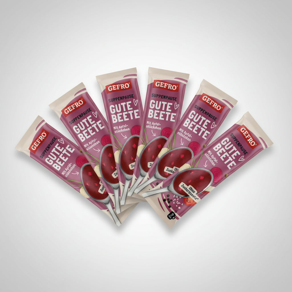 Sechs Verpackungen der GEFRO „Suppenpause Gute Beete“ sind fächerförmig auf hellem Hintergrund angeordnet. Die pink gestalteten Packungen zeigen eine rote Beete-Suppe mit Zutatenabbildungen und den Hinweis auf verschiedene Geschmacksvarianten.