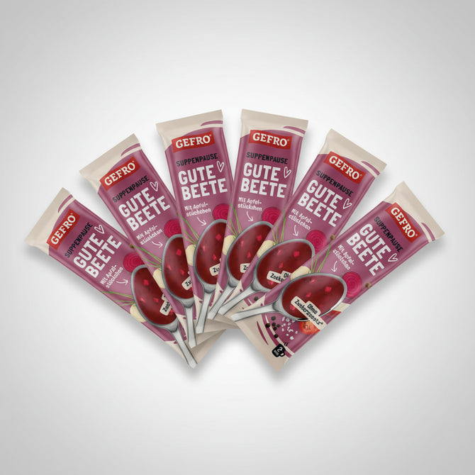 Sechs Verpackungen der GEFRO „Suppenpause Gute Beete“ sind fächerförmig auf hellem Hintergrund angeordnet. Die pink gestalteten Packungen zeigen eine rote Beete-Suppe mit Zutatenabbildungen und den Hinweis auf verschiedene Geschmacksvarianten.