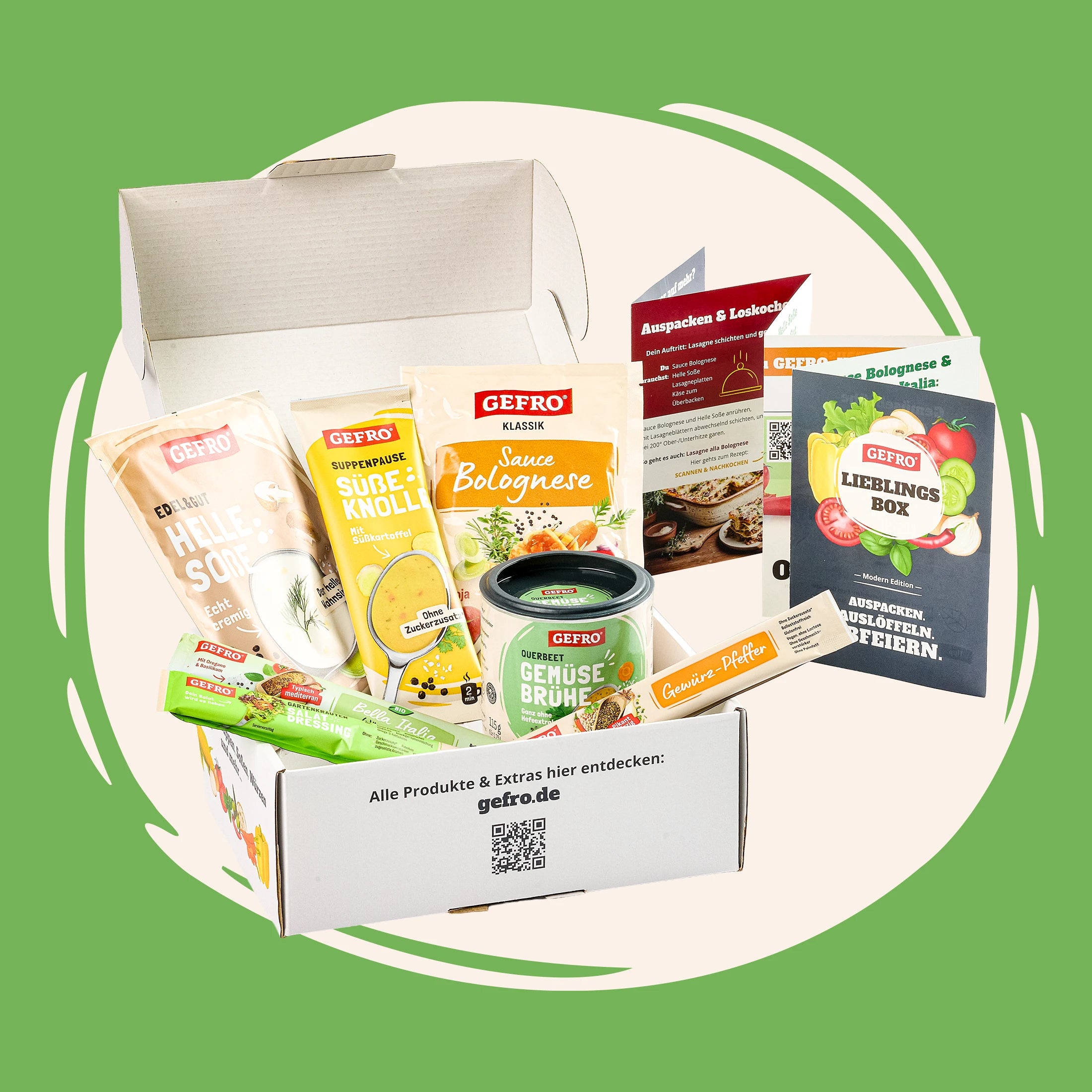Offene GEFRO Probierbox mit Suppen, Sauce, Brühe und Gewürzen sowie Rezeptkarten auf grünem Hintergrund