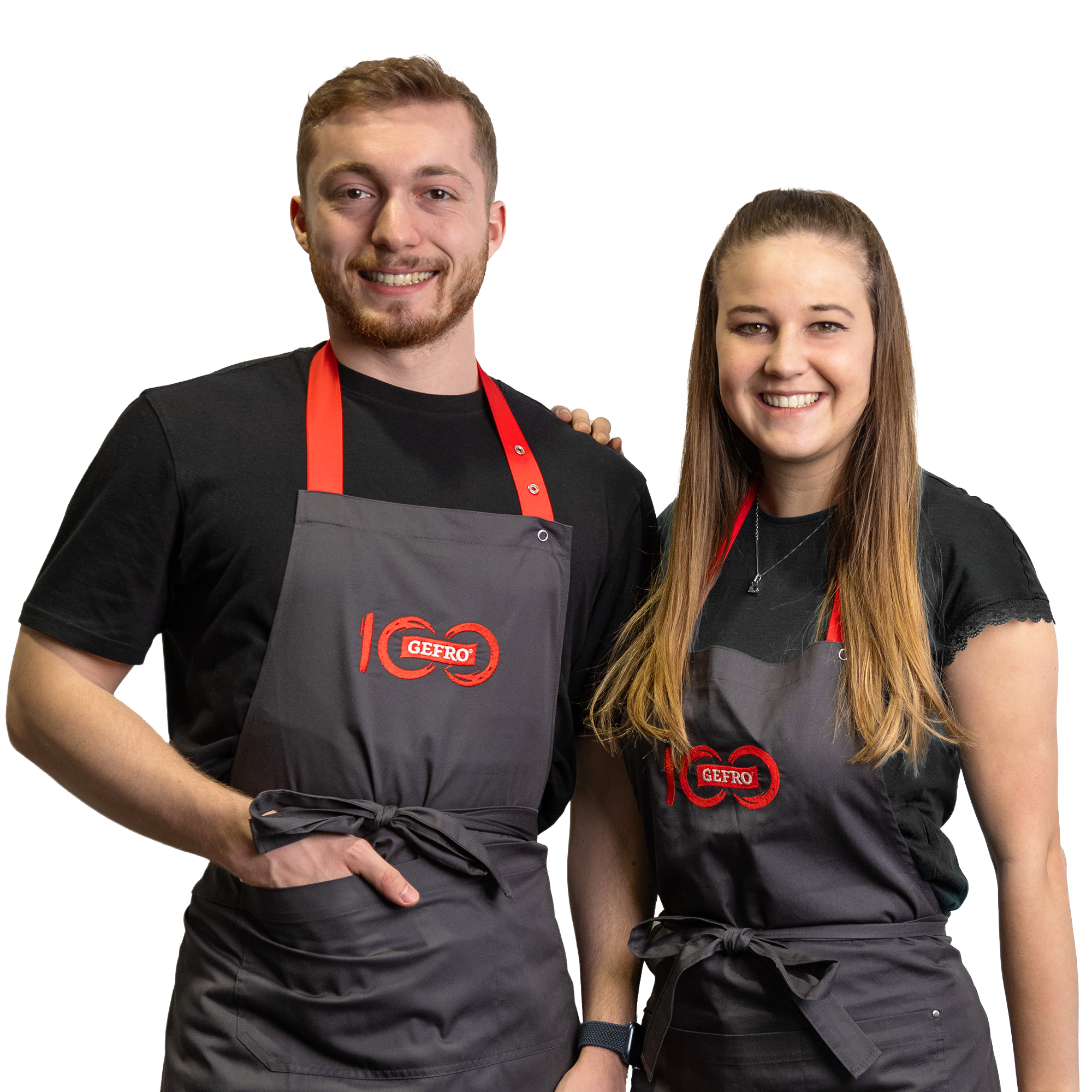 Zwei lächelnde Mitarbeitende in schwarzen Shirts und grauen GEFRO-Schürzen, freundlich und serviceorientiert präsentiert.