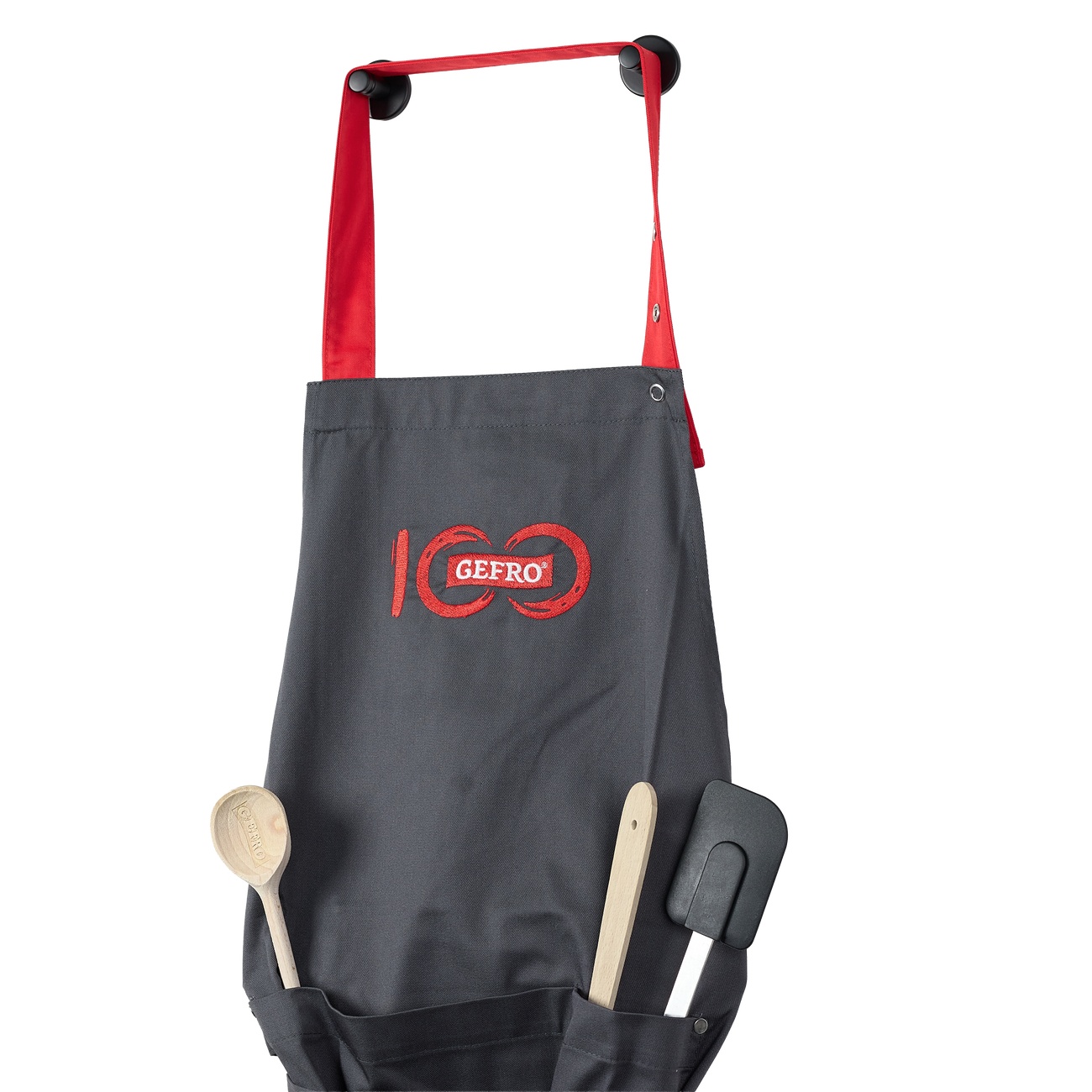 Schwarze Küchenschürze mit roten Bändern, GEFRO-Logo und Taschen für Kochlöffel und Pfannenwender