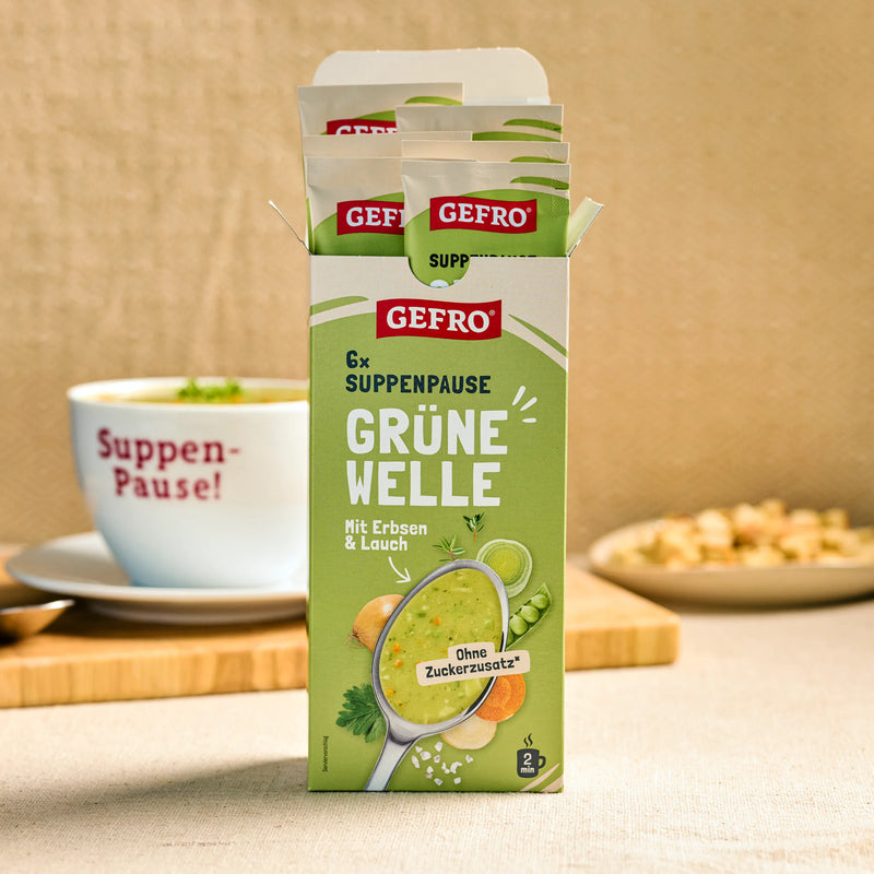 Geöffnete Packung GEFRO Suppenpause Grüne Welle mit Portionsbeuteln, Erbsen-Lauch-Suppe ohne Zuckerzusatz
