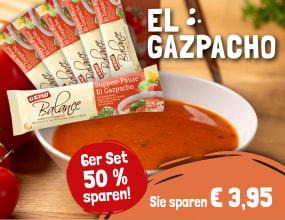 Schale mit roter Gazpacho-Suppe, daneben Verpackungen des Produkts „El Gazpacho“. Hinweis auf 50 % Ersparnis pro Set.
