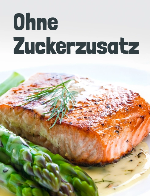 Gebratener Fisch mit grünem Spargel dazu eine cremige helle Soße, dekoriert mit Dill