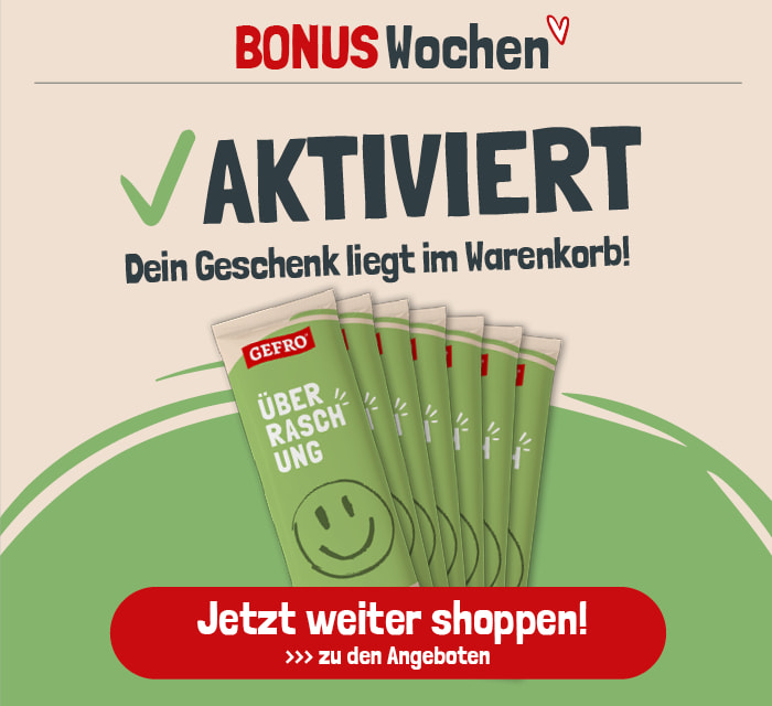 AKTIVIERT“ in der Mitte. Darunter steht in Weiß und Rot der Text „✓ GESCHENK LIEGT IM WARENKORB“, umgeben vom sich wiederholenden hellgrauen Schriftzug „BONUS-WOCHEN