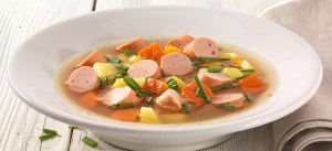 Klarer Kürbiseintopf mit Kartoffeln und Wienerle