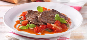 Minutensteak vom Rind auf Kirschtomatensugo mit Basilikum